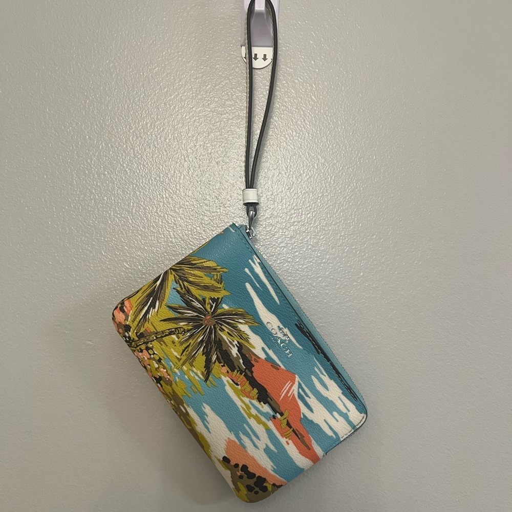 Hawaiian Coach Wristlet. Used once. Excellent condition.